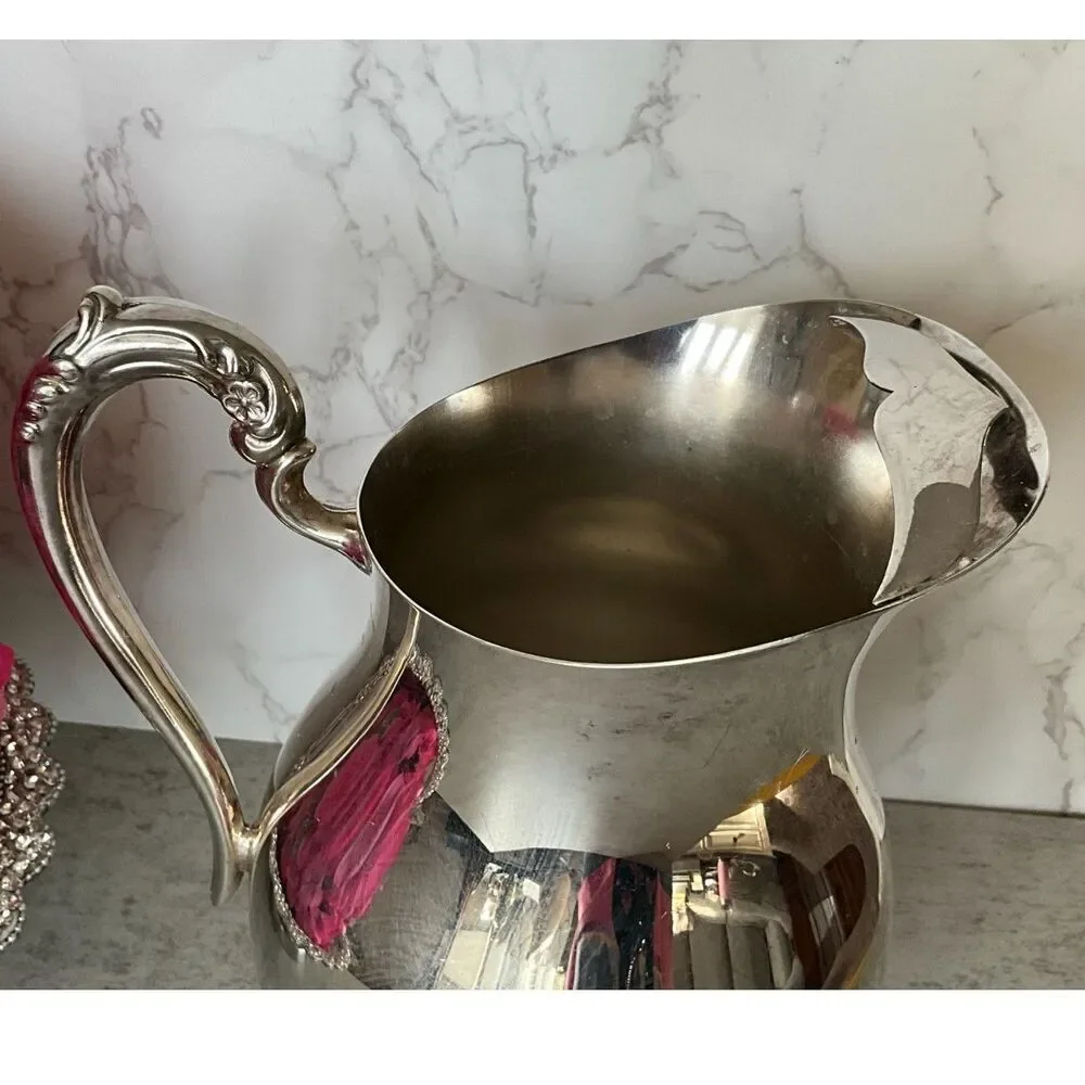Vintage F. B. Rogers Silver Co. silver plated water pitcher with ice catch